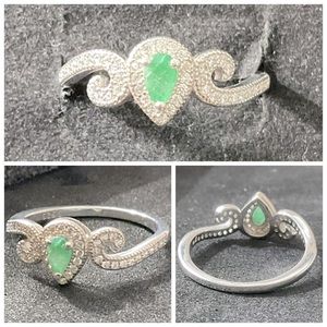 Halo pear emerald on Stirling 92.5 silver ring. New unused.